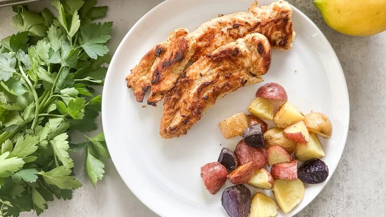 plated chicken and roasted potatoes