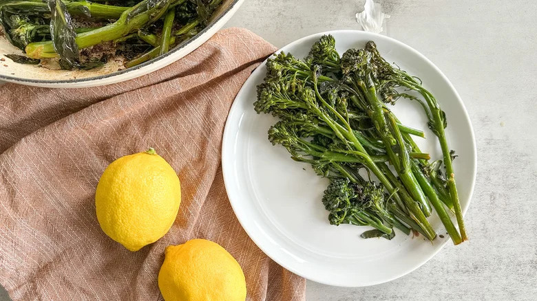 broccolini on plate with lemon