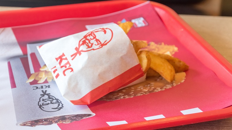 KFC potato wedges on red tray