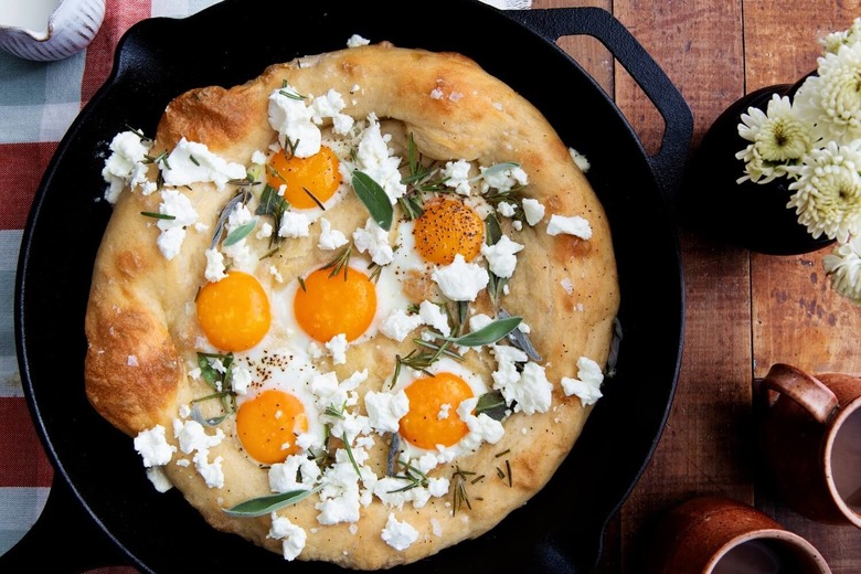 Sunny Side Up Egg Pizza With Goat Cheese and Herbs