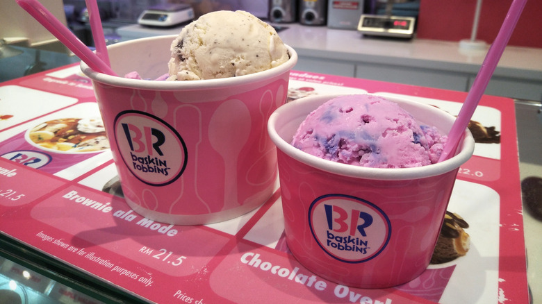 Two Baskin-Robbins ice cream cups