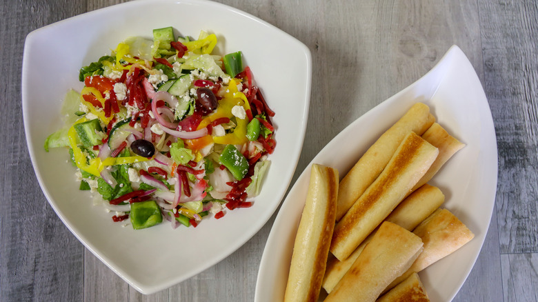 Olive Garden salad and breadsticks