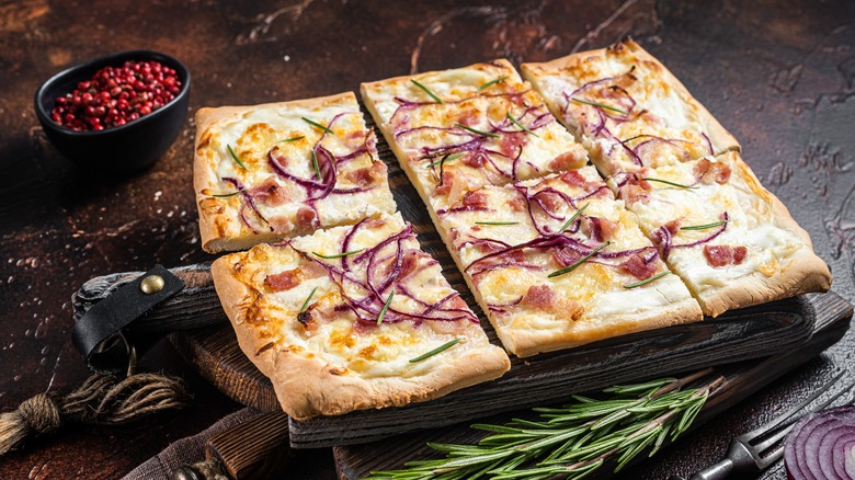 French onion tart on board