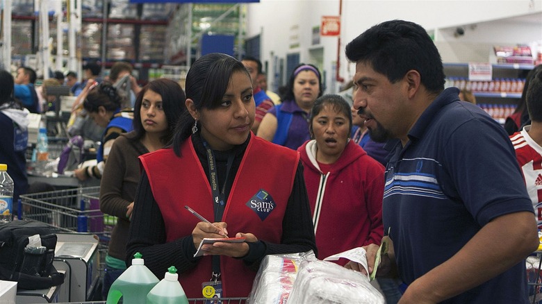 Sam's Club employee and customers