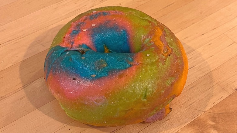 Rainbow bagel on table