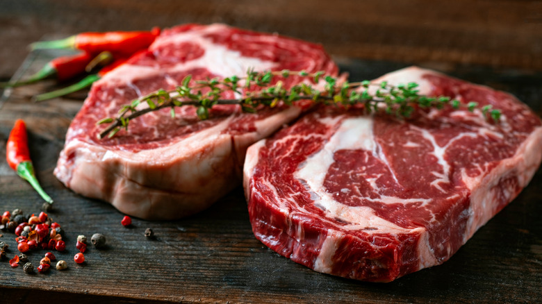 Raw ribeye steaks