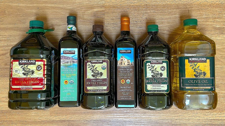 Assorted bottles of Kirkland Signature brand olive oil