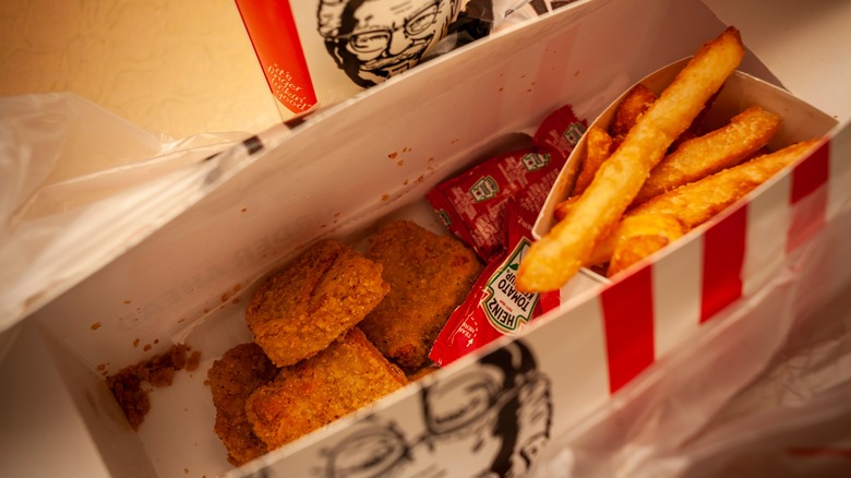 box of KFC Beyond Fried Chicken Nuggets and fries