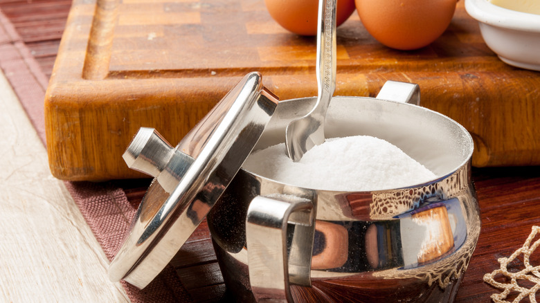 sugar in a silver sugar dish 