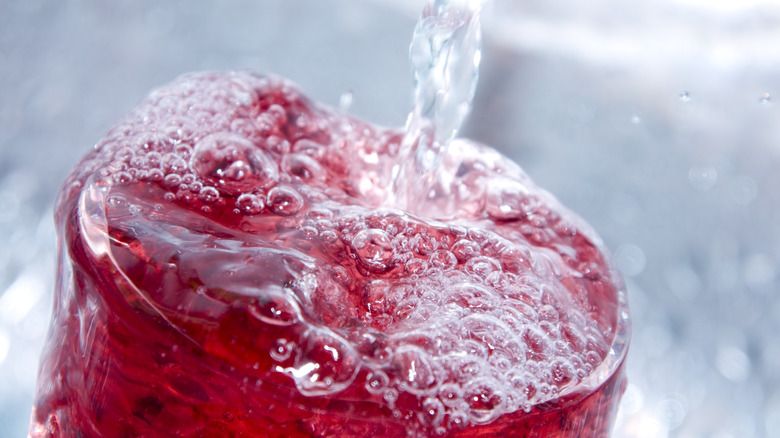 Drink pouring into a glass