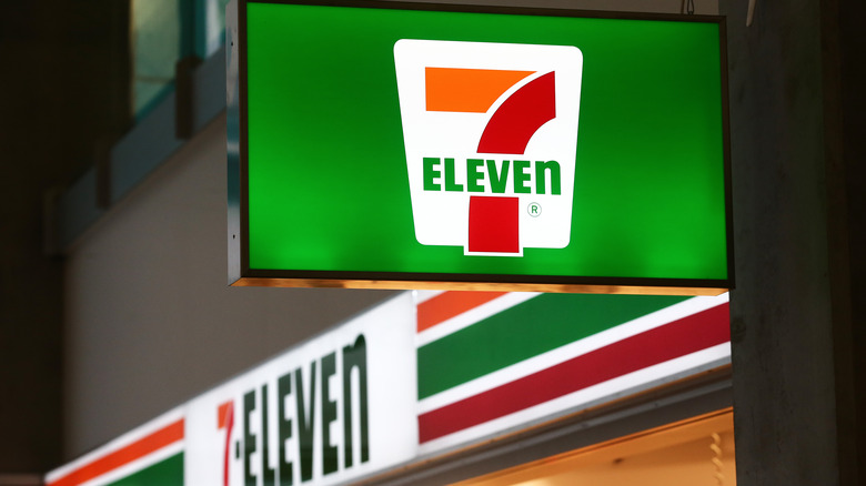 7-Eleven sign lit up at night