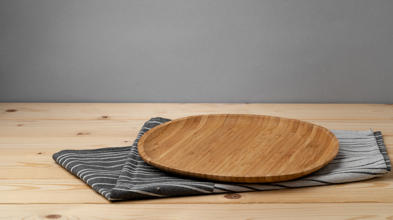 wooden board with cotton napkin