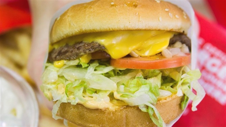 Del Taco cheeseburger with lettuce