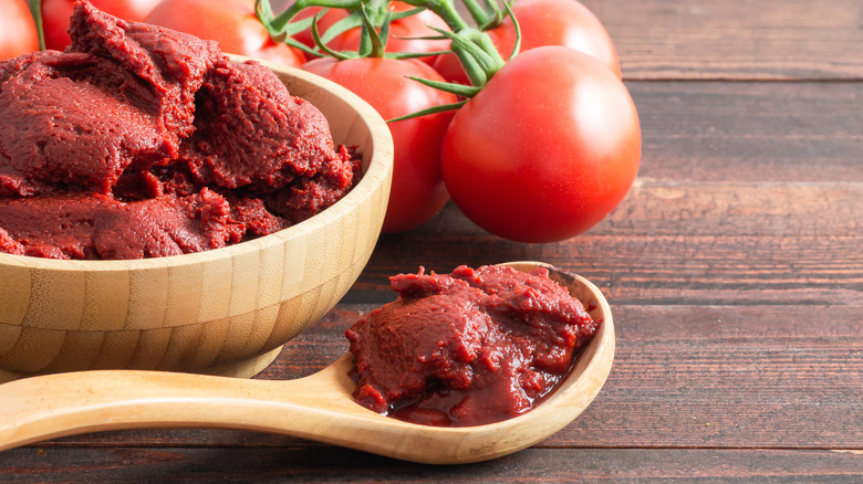 tomato paste in a wooden bowl