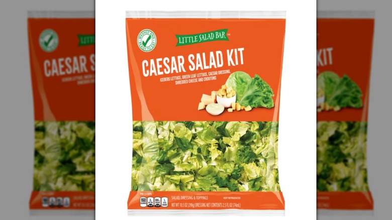 Aldi's Little Salad Bar Caesar salad kit on white background