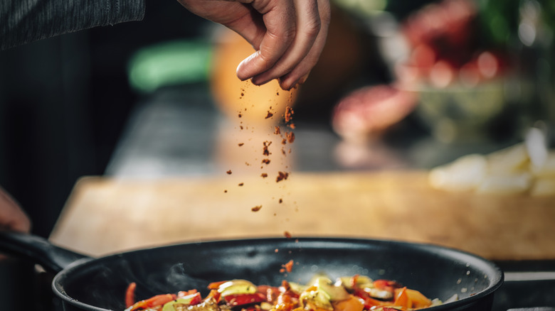 Hand seasoning a pan