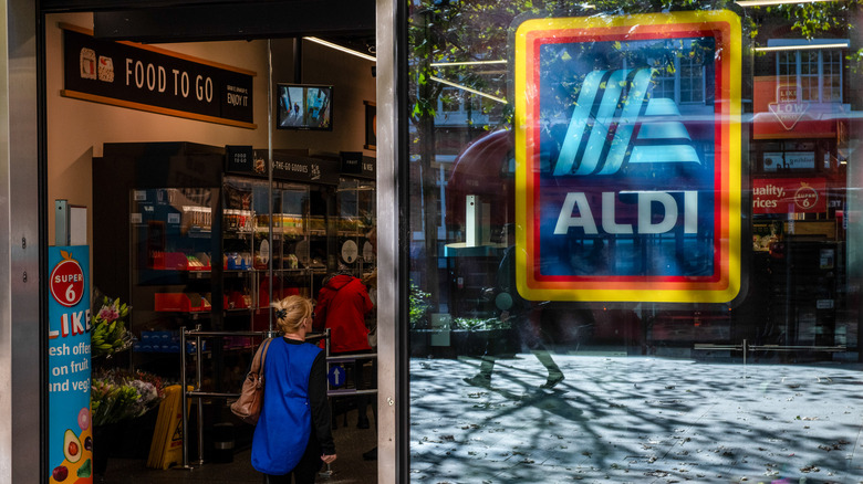 Aldi sign sliding glass door