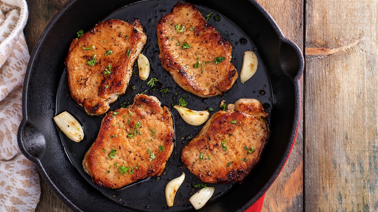 Pork chops in cast iron pan 