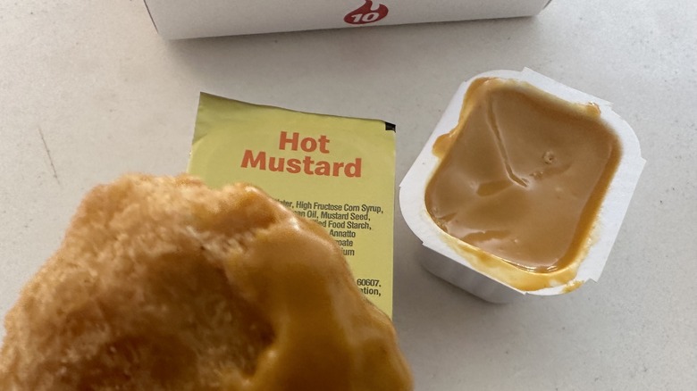 nugget dipped in hot mustard