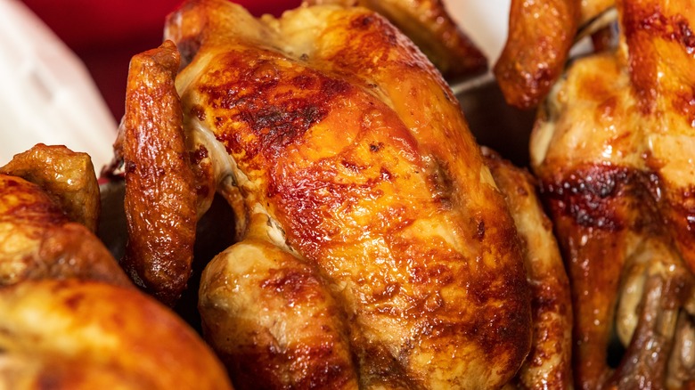 Cooked chickens with crispy skin