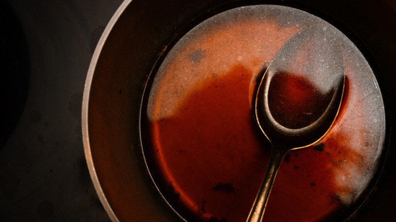 a spoonful of a red wine reduction