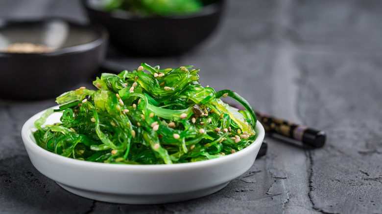 Wakame salad topped with sesame seeds