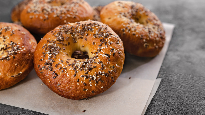 Four bagels with sesame seeds