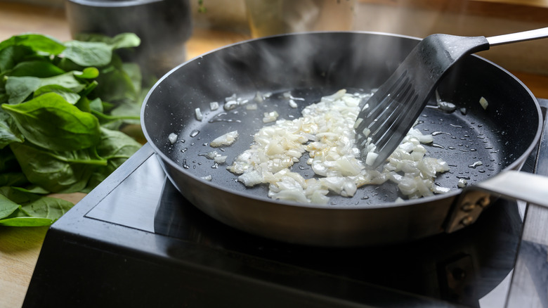 Onions cooking in pan