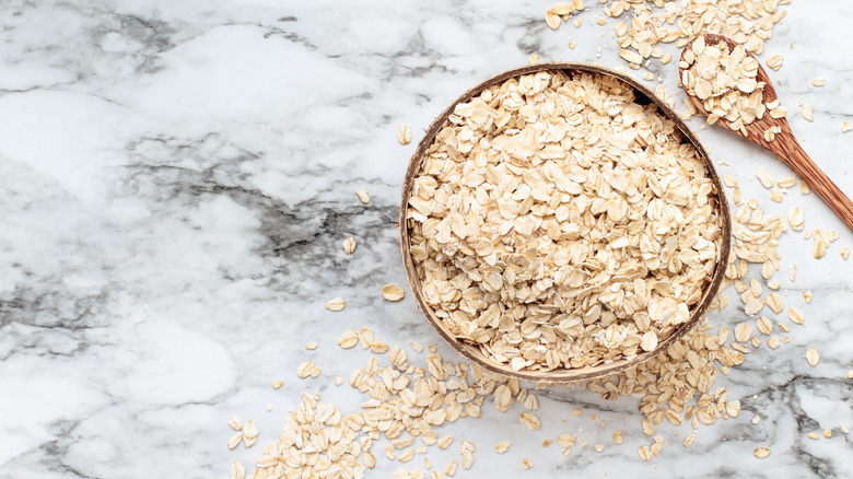 Oats in bowl with spoon