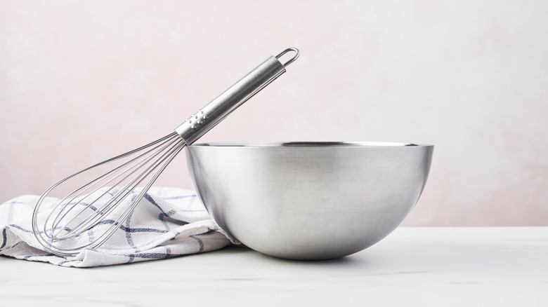 Metal whisk and bowl