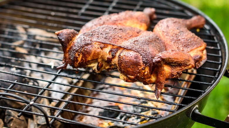 Butterflied chicken breast on grill