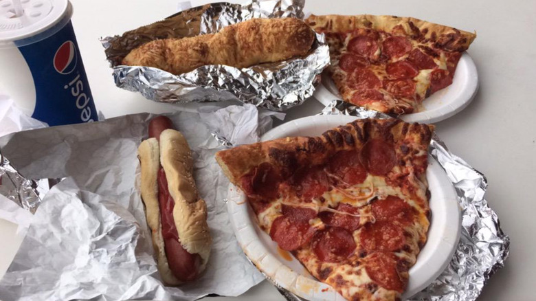 Costco hot dog, chicken bake, and pepperoni pizza slices