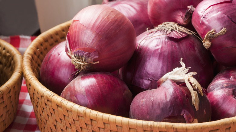 red onions in basket