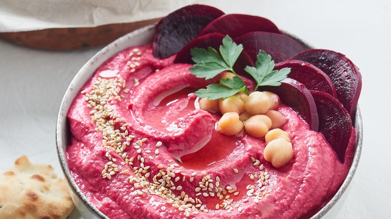 beets hummus with beet slices 