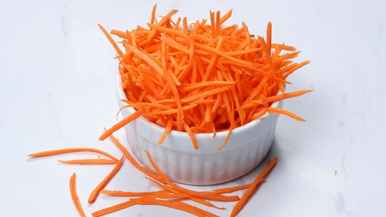 Shredded carrots in cup