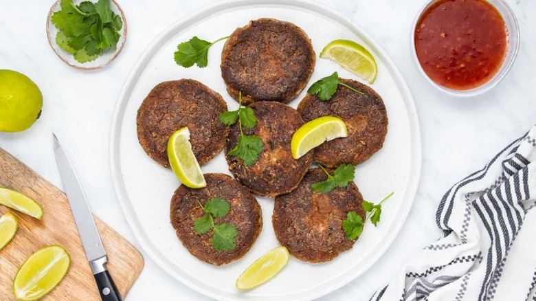 Crab cakes served with sauces