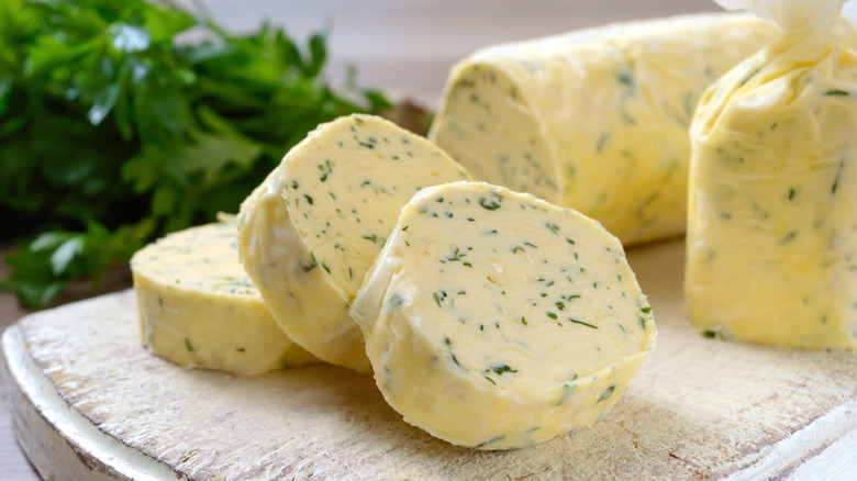 Herb butter on cutting board