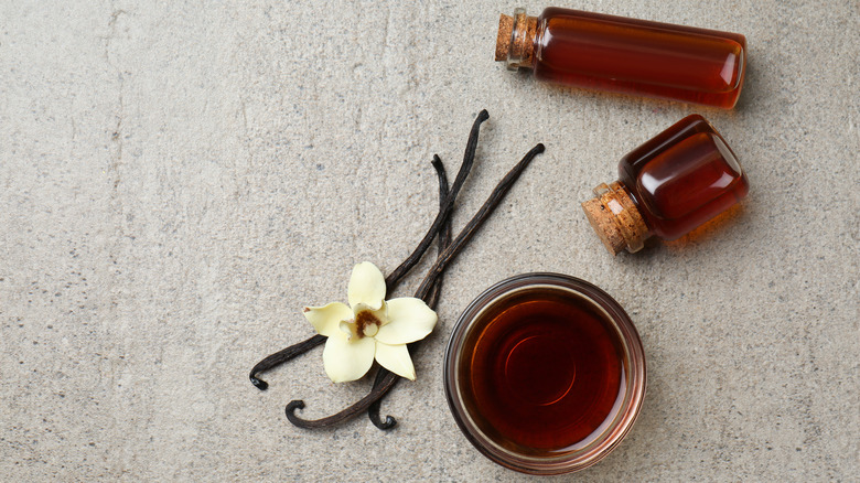 vanilla extract in bowl and jars