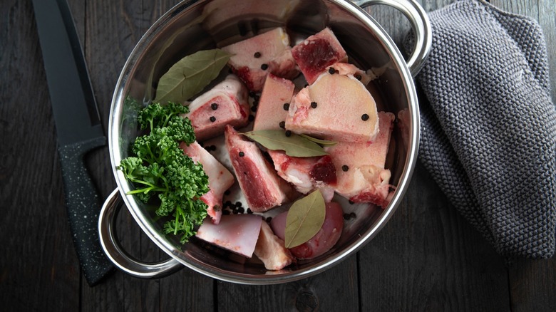 Beef chunks in soup pot