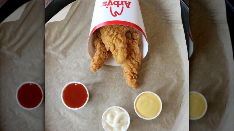 Chicken tenders on brown paper