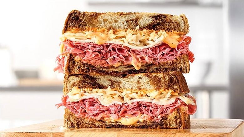 two halves of Reuben sandwich 