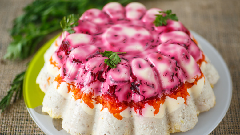 Pink gelatin dessert on plate