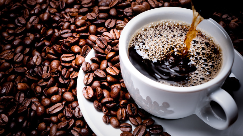 Coffee cup and coffee beans