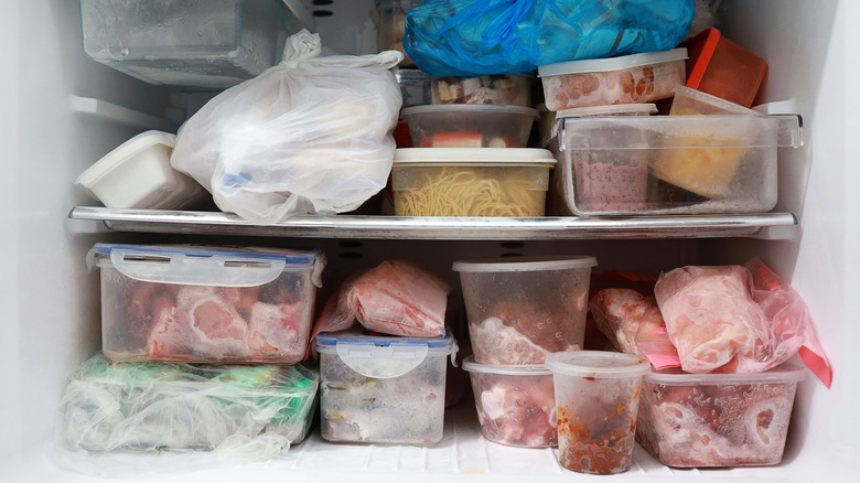 containers, tupperware, bags in freezer