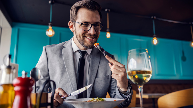 Man taking a bite of food