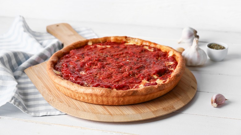 whole deep dish pizza on board