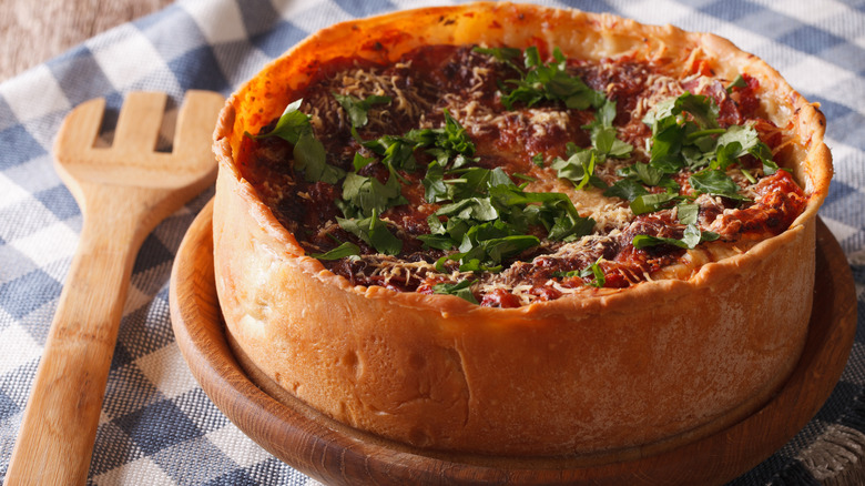 homemade deep dish pizza on plate