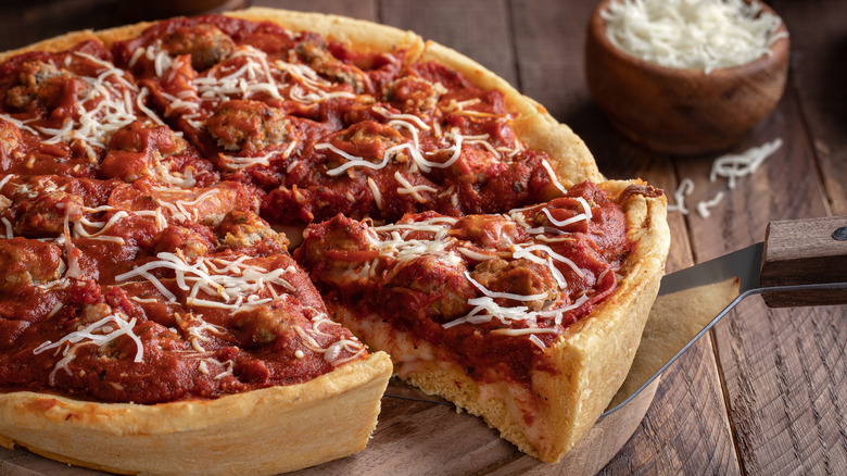 sliced deep-dish pizza