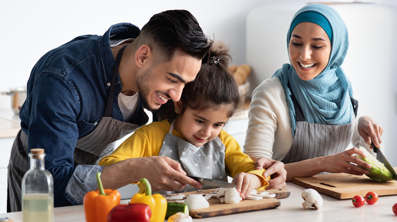 Islamic family cooking together