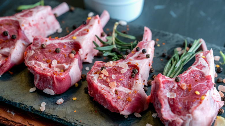 Raw seasoned lamb chops